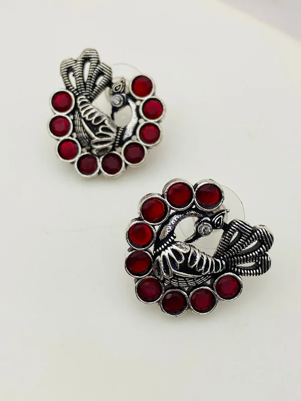 Stud Earrings for Christmas Party -Appealing Red Stone Studded Peacock Designed Silver Toned Oxidized Stud Earrings