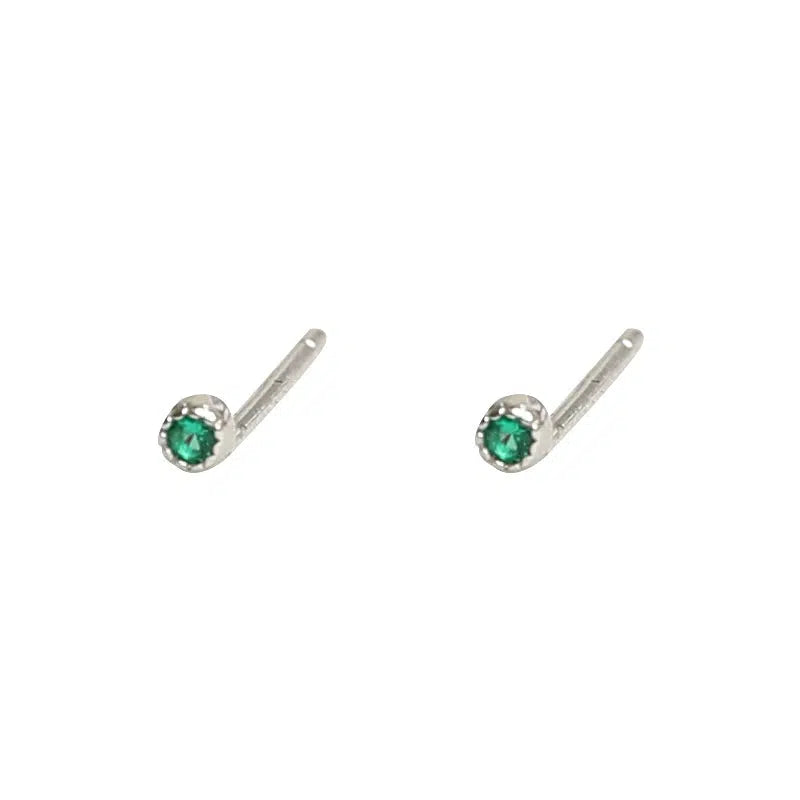 A pair of green earrings