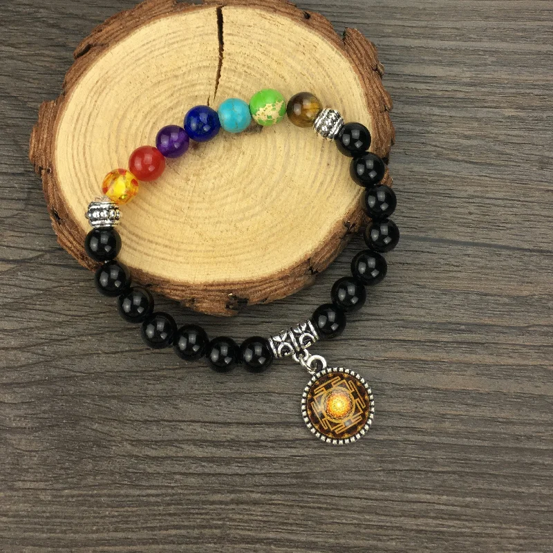 Sleek bangle bracelets with black enamel for a sophisticated and modern look-7 Chakra Stones Sri Yantra Charm Bracelet