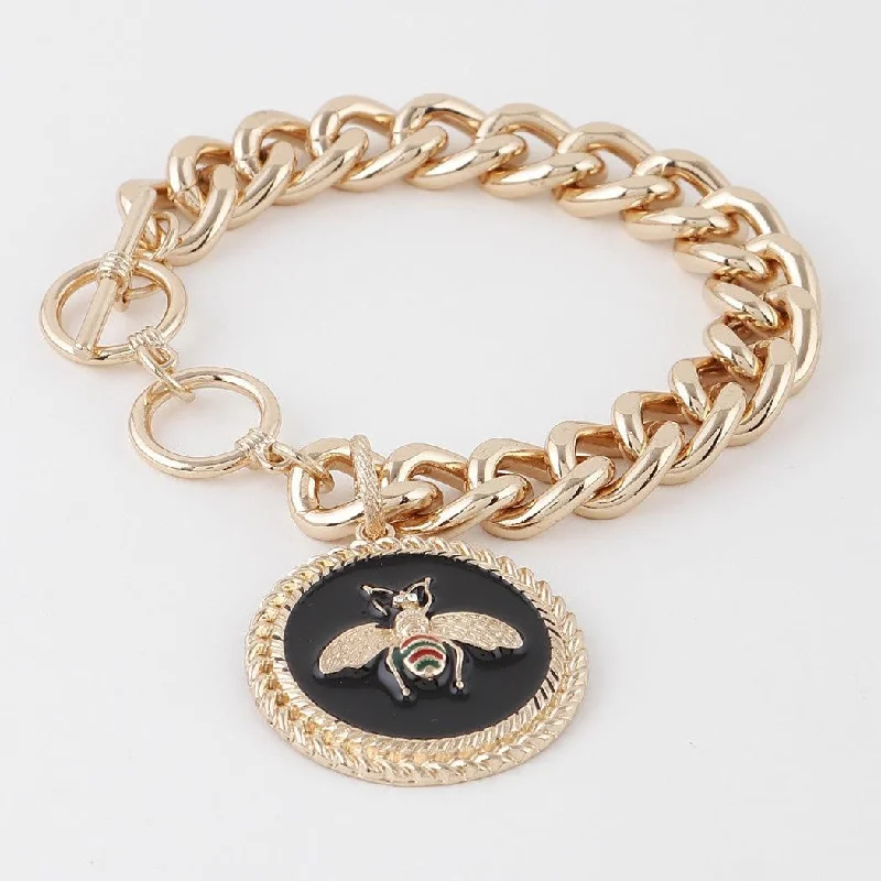 Sleek bangle bracelets with polished titanium for a modern and lightweight option-Bee Emblem Toggle Chain Bracelet