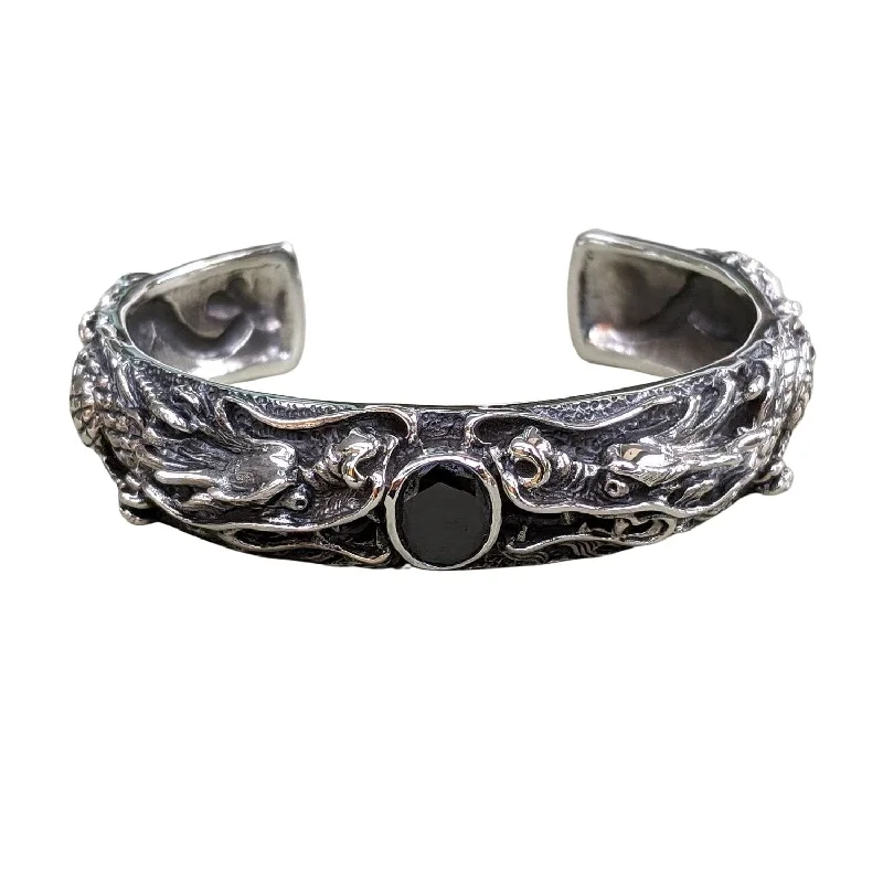 Best bangle bracelets with pastel-colored stones for a soft and delicate appearance-Black Onyx Sterling Silver Dragon Men's Cuff Bracelet