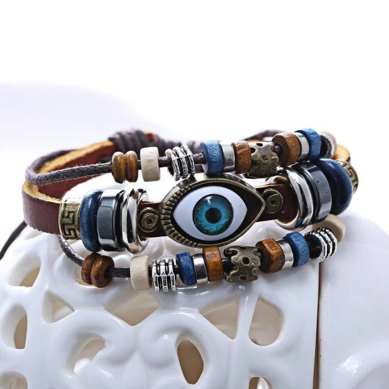 Best bangle bracelets with smooth sterling silver for a polished, refined finish-Evil Eye Adjustable Leather Bracelet