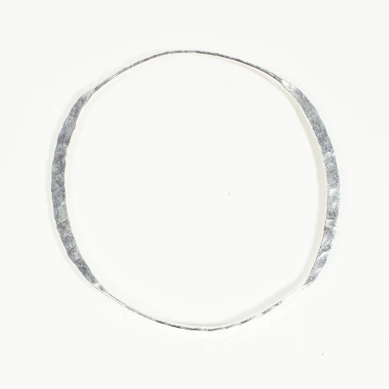 Best bangle bracelets with heart-shaped charms for a romantic and sweet touch-Hammered Silver Bangle