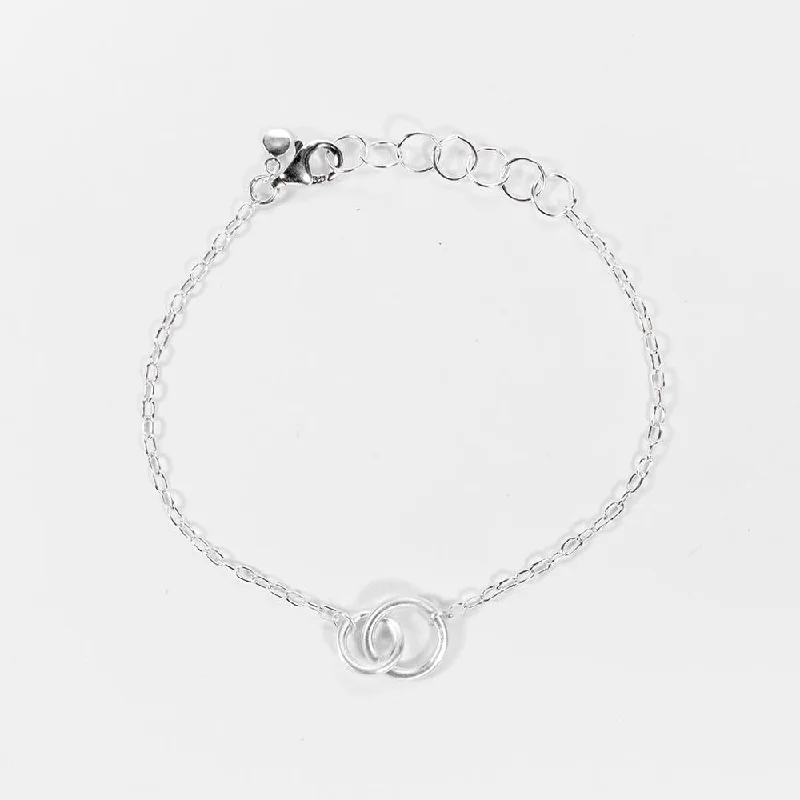 Best bangle bracelets with crystal accents for added sparkle and glamour-Brushed Silver Interlocking Circle Bracelet