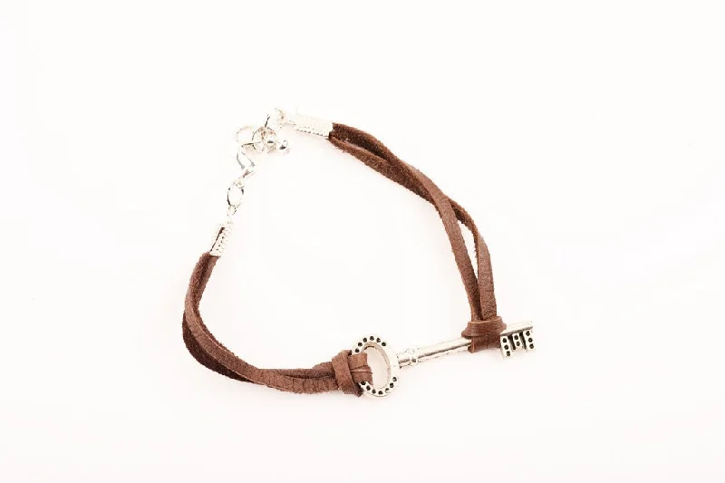 Vintage-inspired bangle bracelets with etched detailing for a timeless, antique look-Leather Key Bracelet