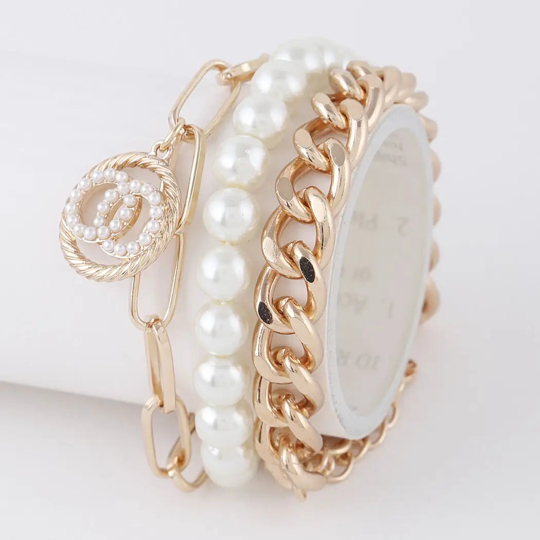 Wide bangle bracelets with animal print designs for a bold and exotic look-Pearl Multi Chain Bracelets