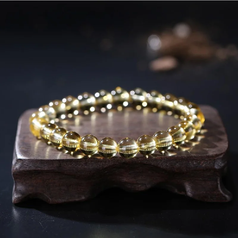 Best bangle bracelets with engraved floral patterns for a delicate and elegant design-Natural Clear Topaz Beads Bracelet