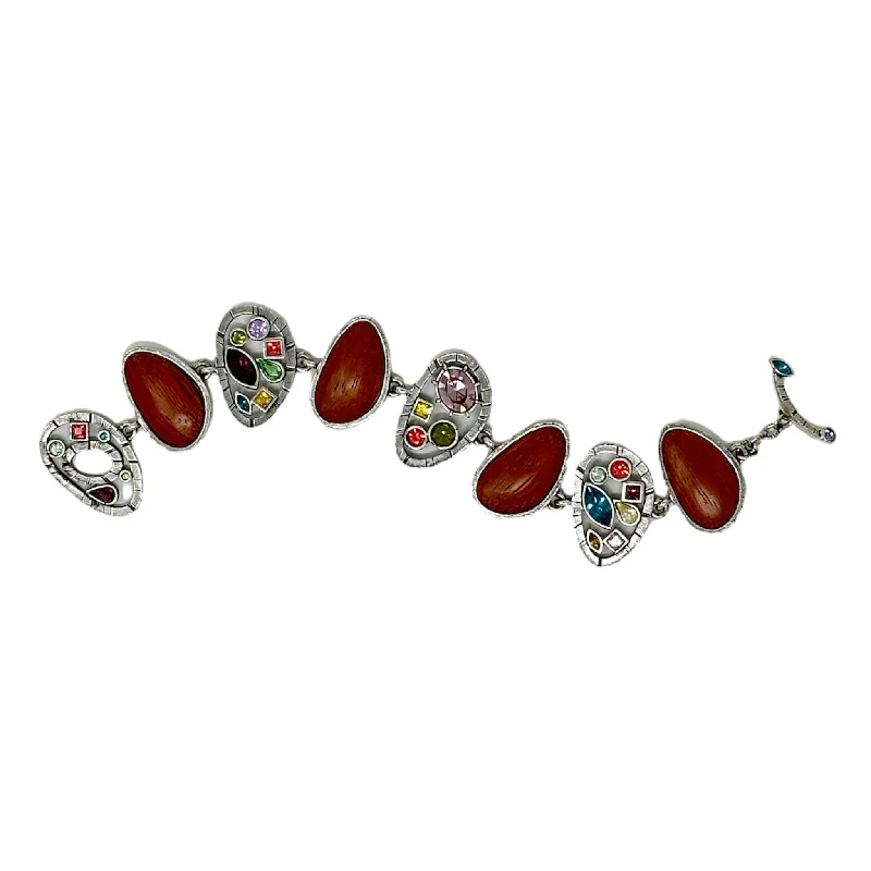 Best bangle bracelets with heart-shaped charms for a romantic and sweet touch-Patricia Locke The Village Bracelet in Silver Kashmir