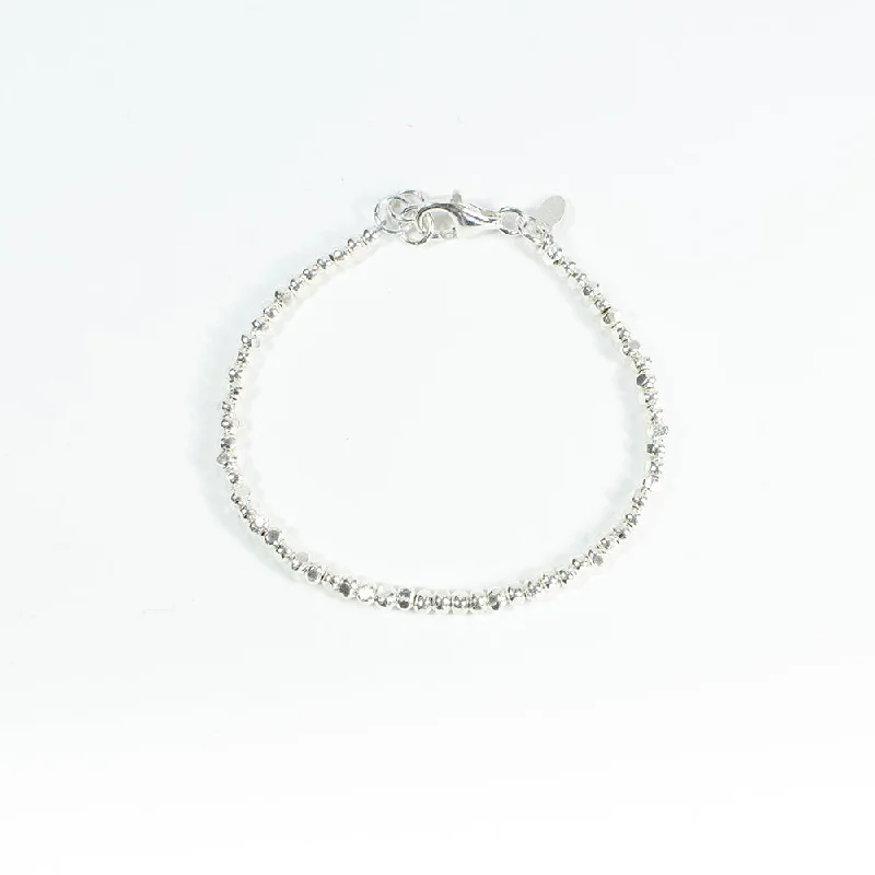 Best bangle bracelets with silver-plated finishes for an affordable and stylish accessory-Silver Tumbled Beaded Bracelet