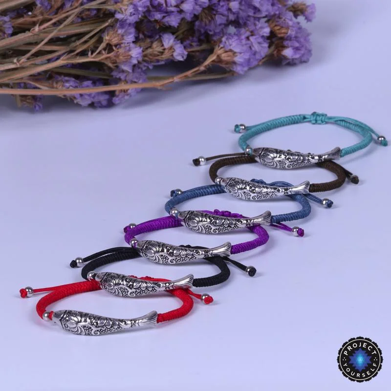 Bangle bracelets with enamel inlay designs for a colorful and eye-catching appearance-Sterling Silver Lucky Fish Buddhist Knots Rope Bracelet