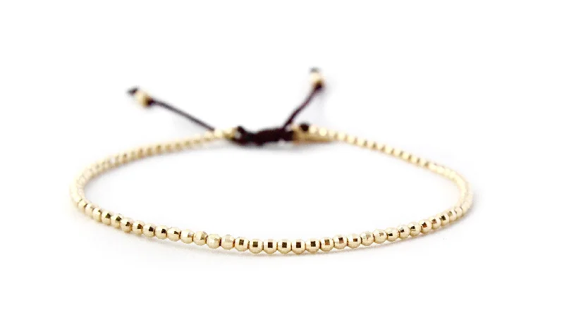 Best bangle bracelets with enamel floral patterns for a delicate and feminine touch-Sparkling Teenie Seeds of Love Bracelet in 14k Gold