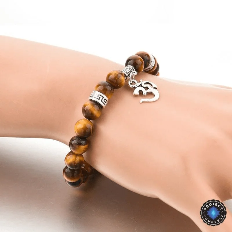 Simple gold bangle bracelets with smooth finishes for a classic and elegant style-Tiger Eye Stone Om Bracelet