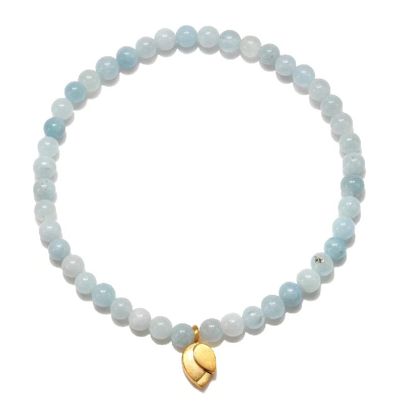 Stacked bangle bracelets with alternating textures for a dynamic, trendy look-Tranquil Journey Lotus Aquamarine Gemstone Bracelet